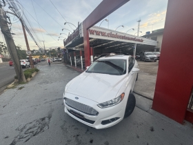 FUSION 2.0 TITANIUM AWD 16V 4P AUTOMÁTICO