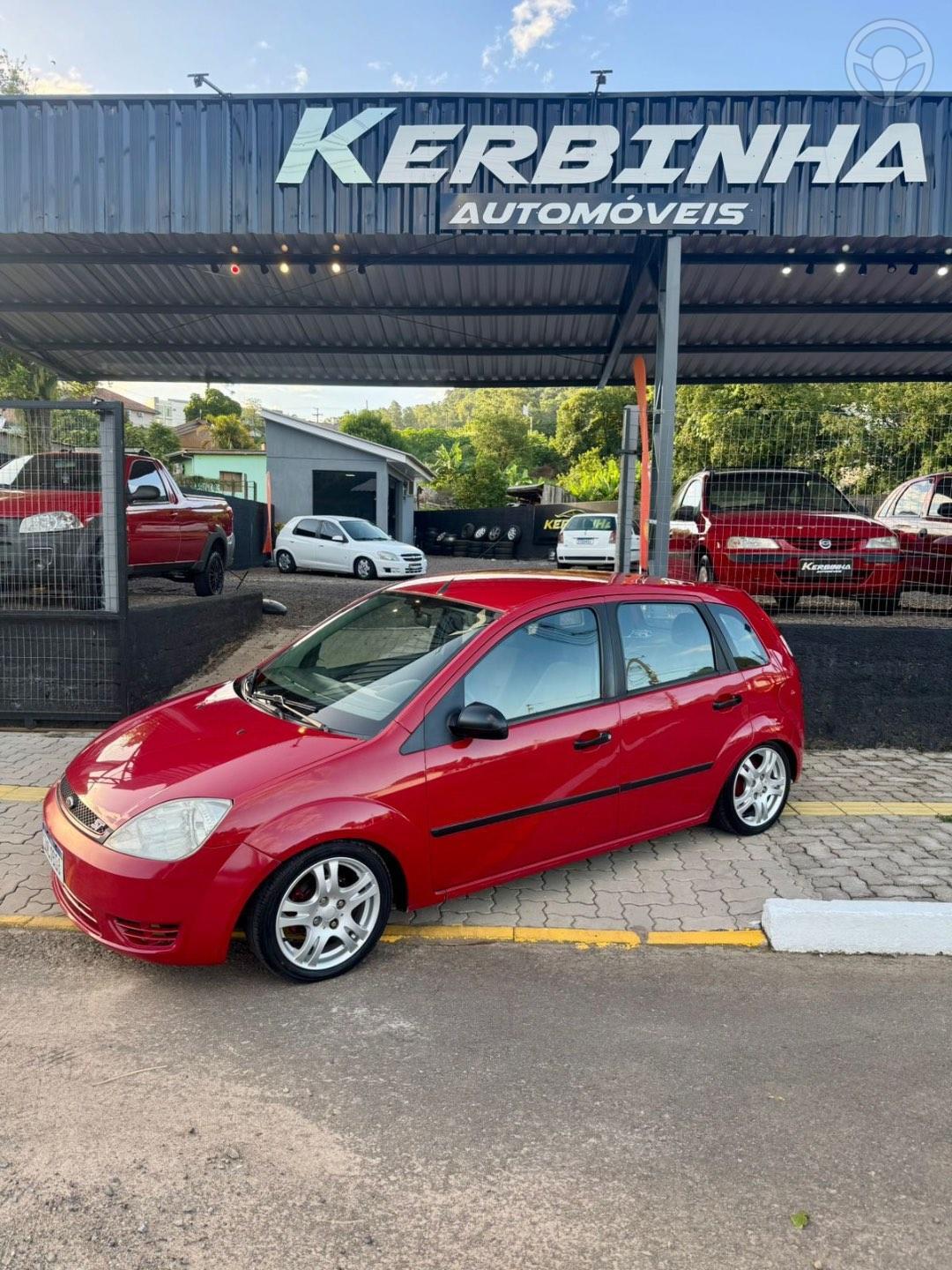 FORD - FIESTA 1.0 MPI 8V 4P MANUAL - 2006/2007 - VERMELHA - R$ 24.900,00