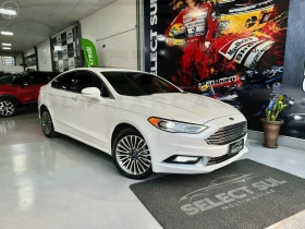 FUSION 2.0 TITANIUM AWD 16V 4P AUTOMÁTICO